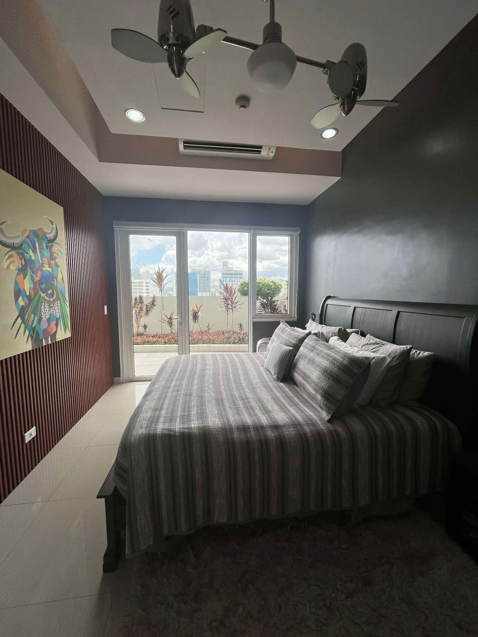 Calyx Residences Unit 9D — Bedroom interior — view 2