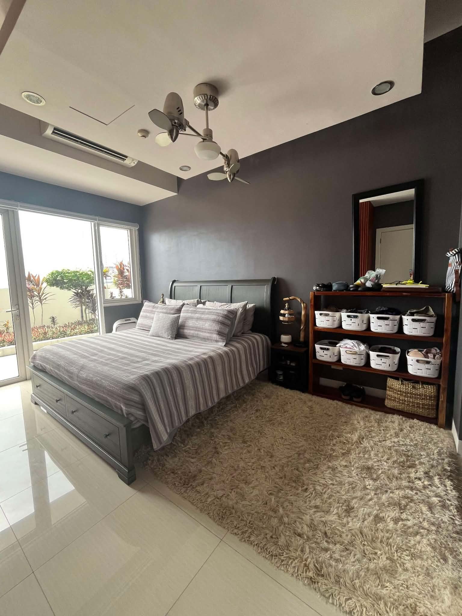 Calyx Residences Unit 9D — Bedroom interior — view 1