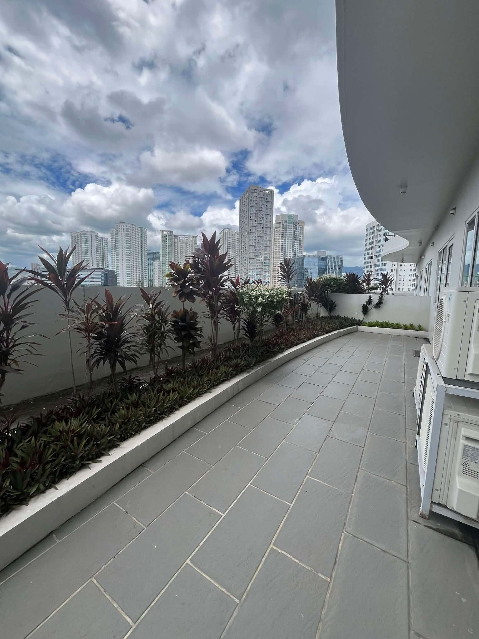 Calyx Residences Unit 9D — Private garden / lanai — view 1