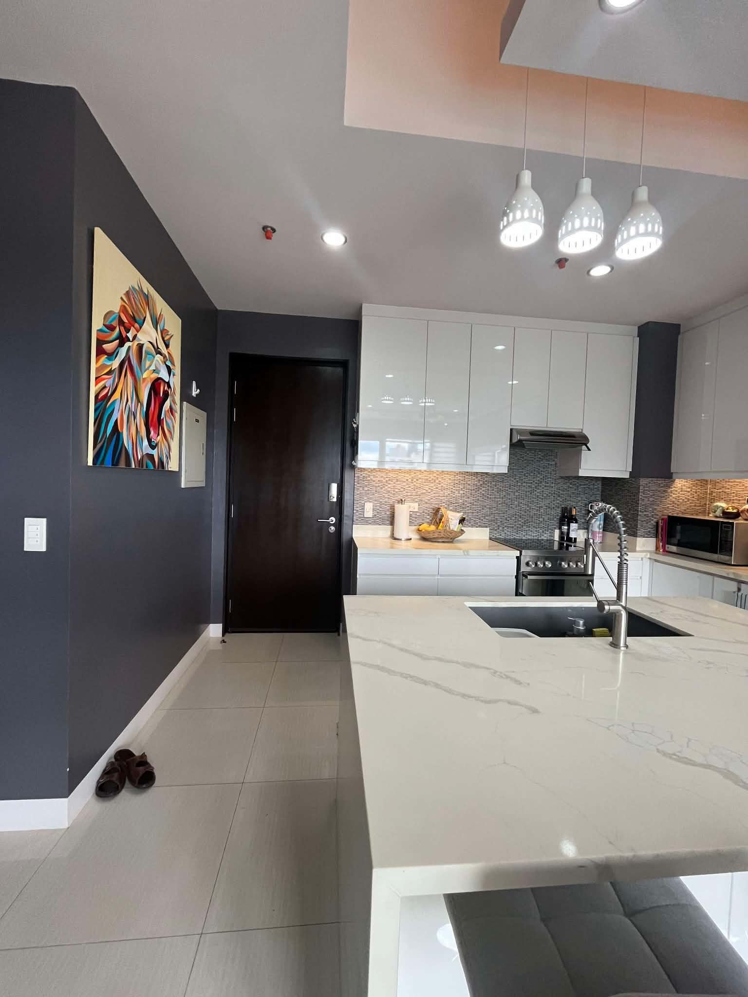 Calyx Residences Unit 9D — Living, dining & kitchen — view 3