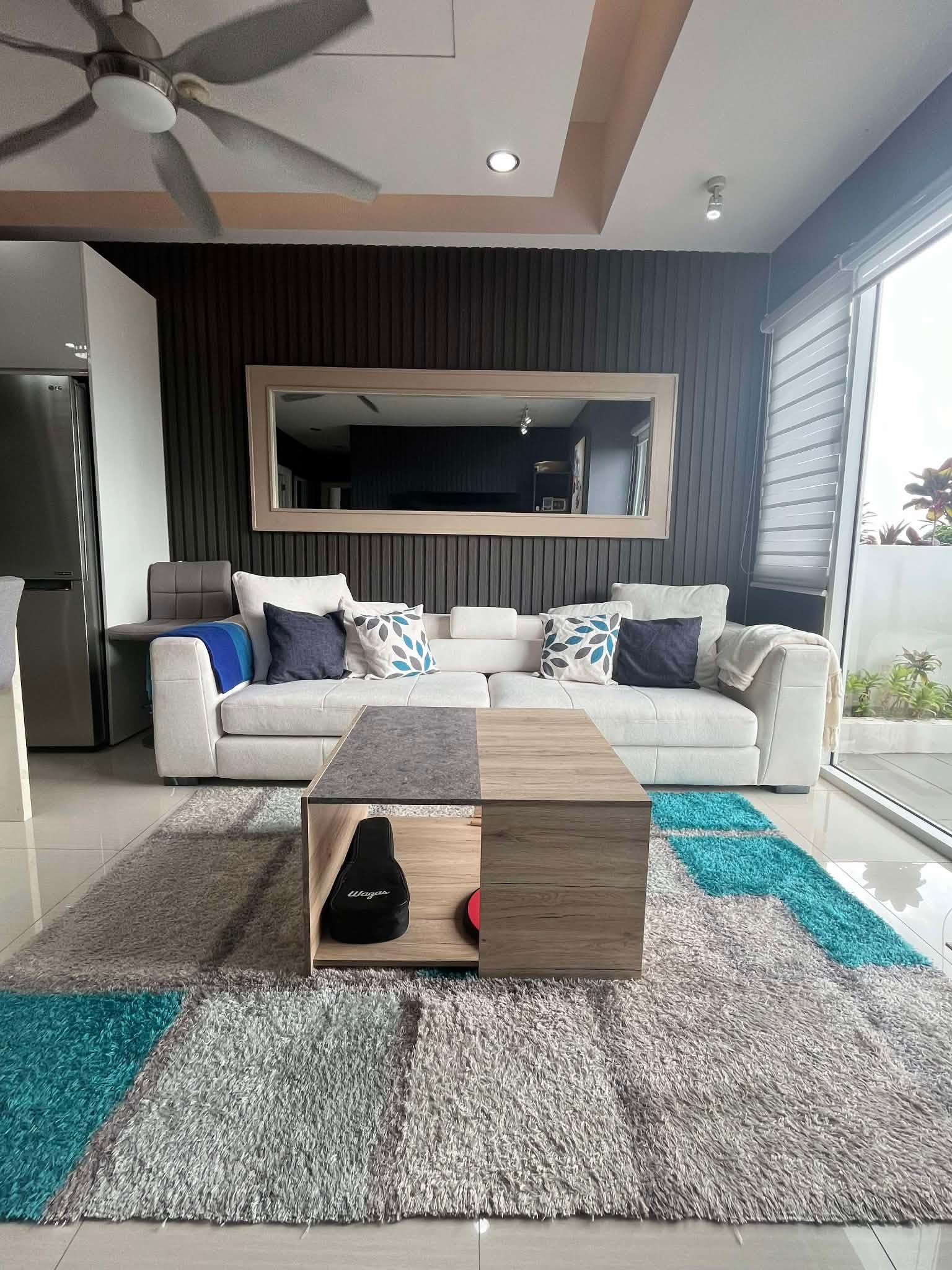 Calyx Residences Unit 9D — Living, dining & kitchen — view 1