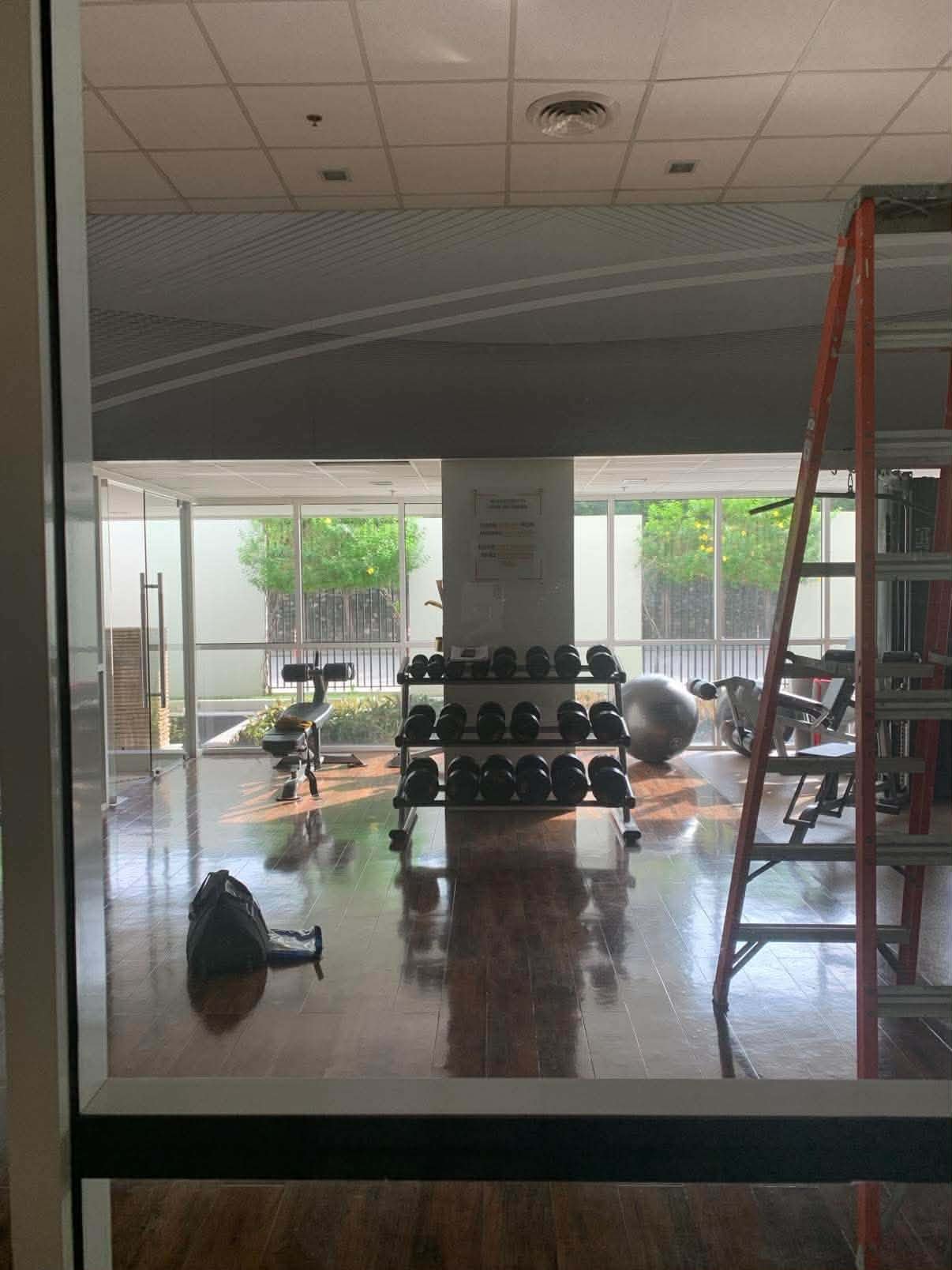 Shared fitness gym — weights and exercise area